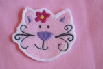 Katzenkopf mit Blume
