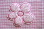 Blume mit rosa Frottee