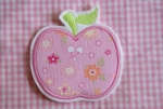 Apfel mit rosa Bl�mchenstoff